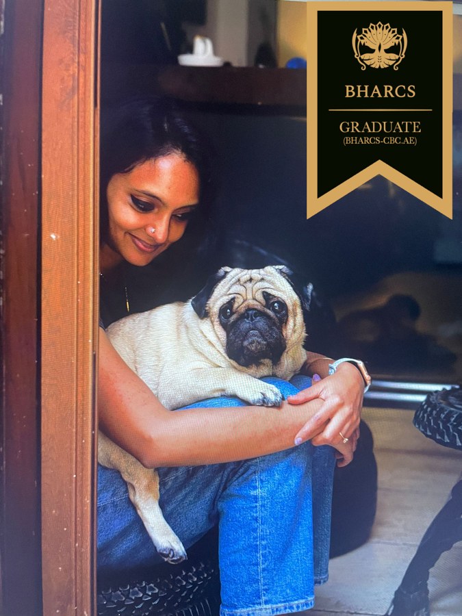 Anushree Thammanna embracing a pug